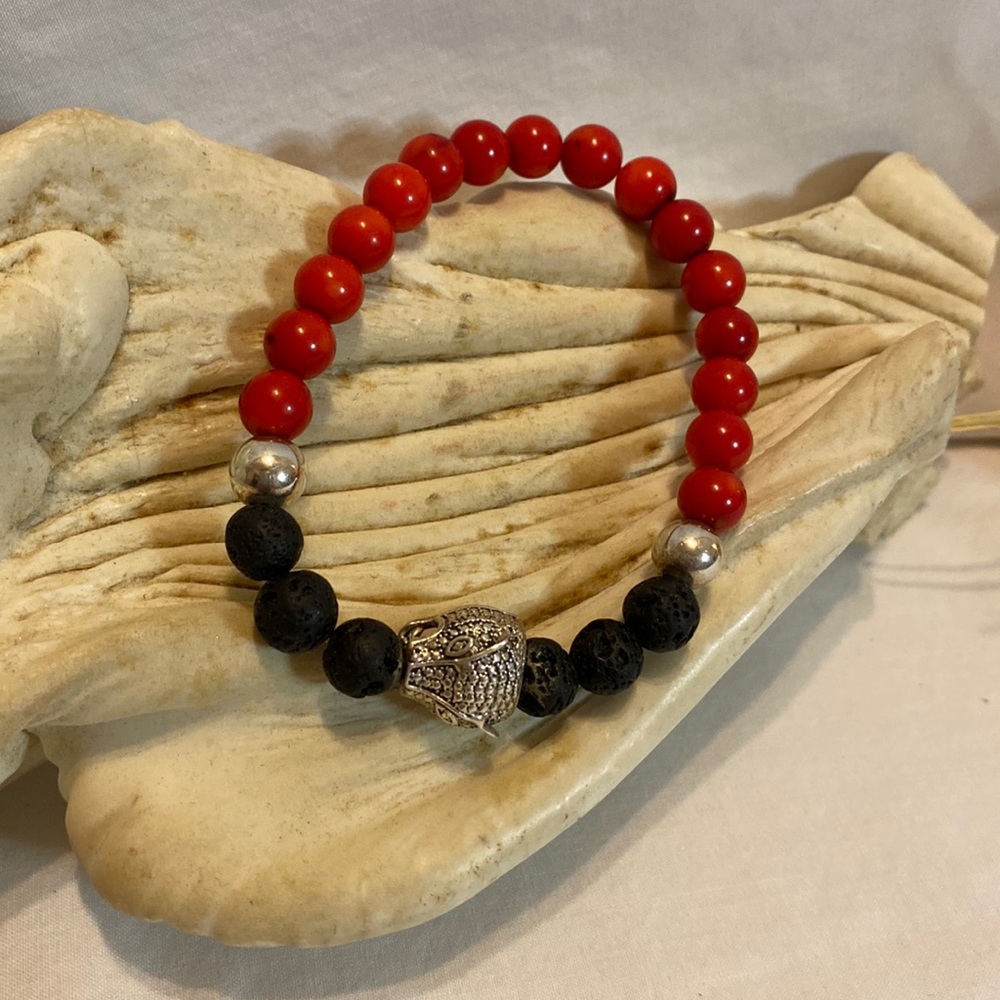 Black and red bead bracelet 7 3/4” stretch with silver accents